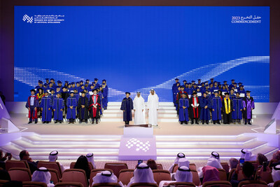 The Class of 2023 with His Highness Sheikh Hamed bin Zayed Al Nahyan (center); His Excellency Dr. Sultan bin Ahmed Al Jaber, Minister of Industry and Advanced Technology, President-Designate of COP28 UAE and Chairman of MBZUAIs Board of Trustees(right);and Professor Eric Xing, MBZUAI President and University Professor (left).