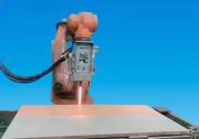 首钢机电结晶器铜板机器人涂熔技术达到国内领先水平